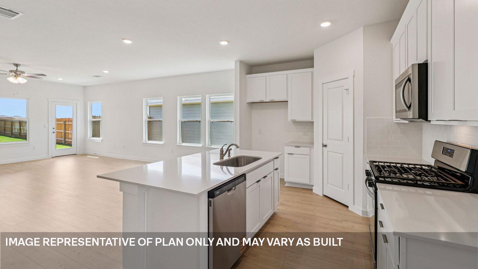 Kitchen with stainless steel appliances.