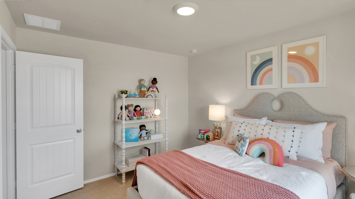 bedroom decorated in colorful decor with a window