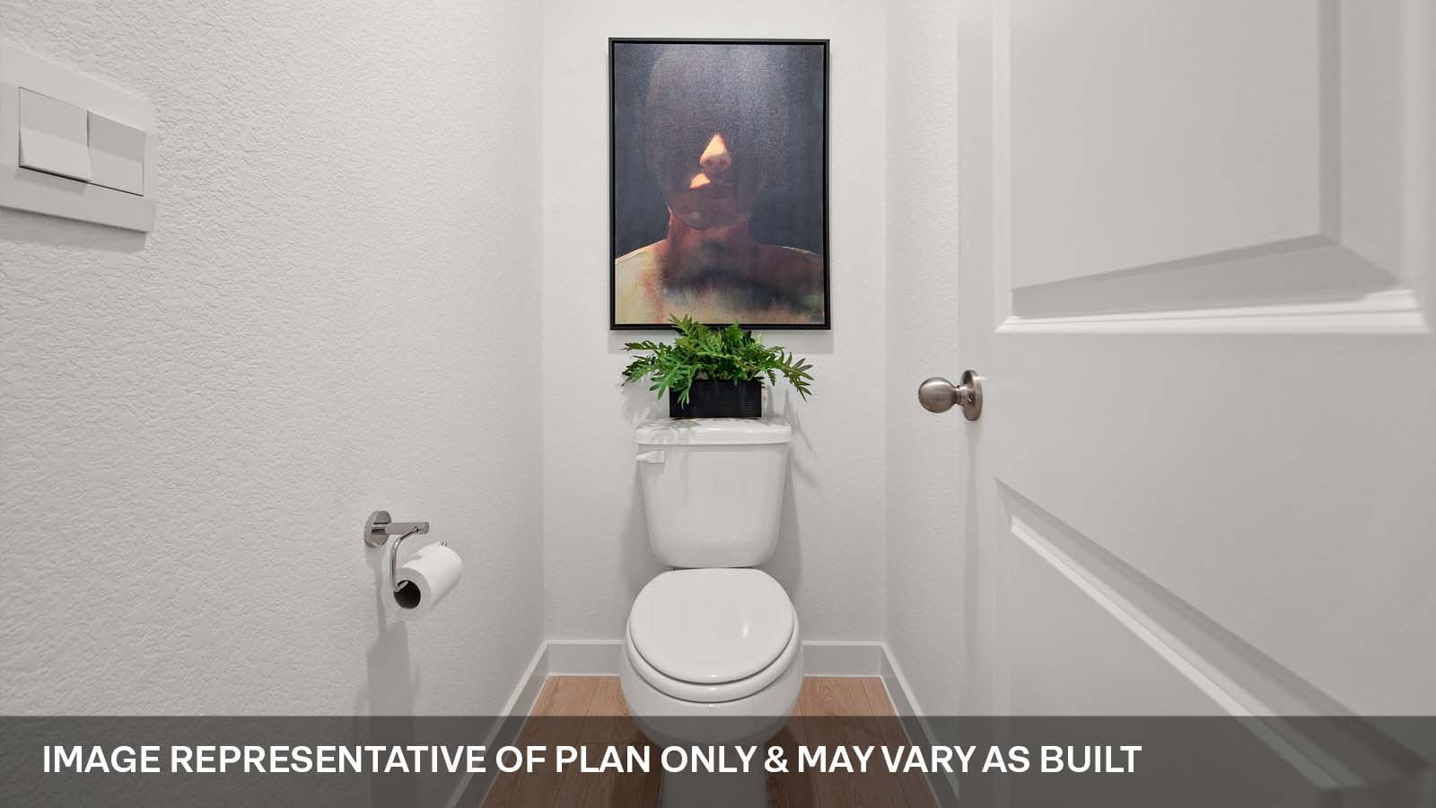 Water closet in bathroom.