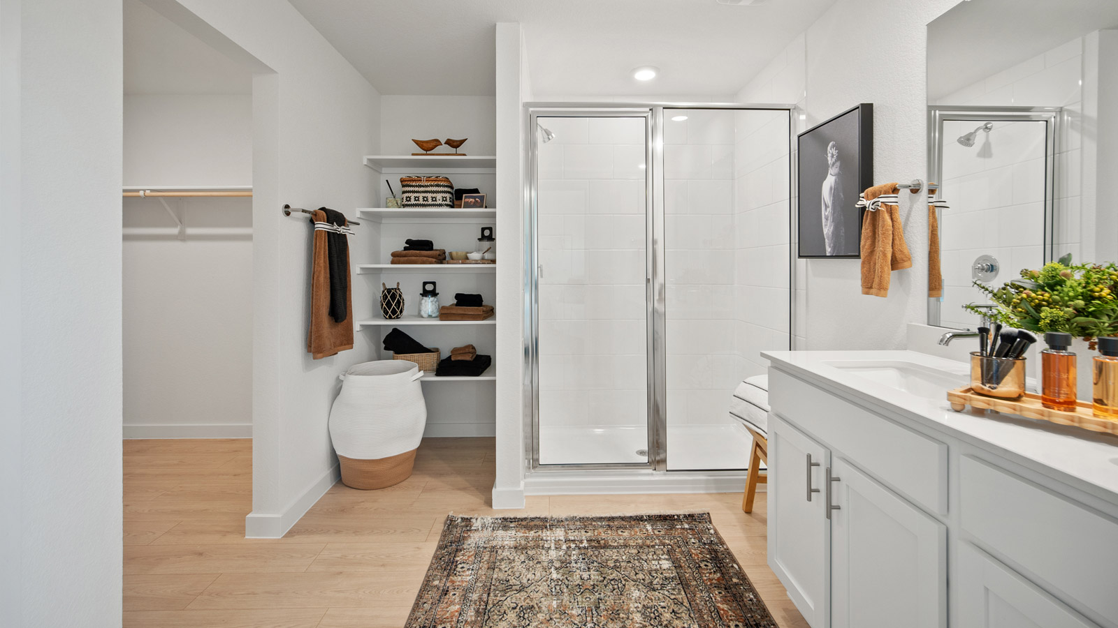 Beautiful main bathroom with walk-in shower and double vanity sink.