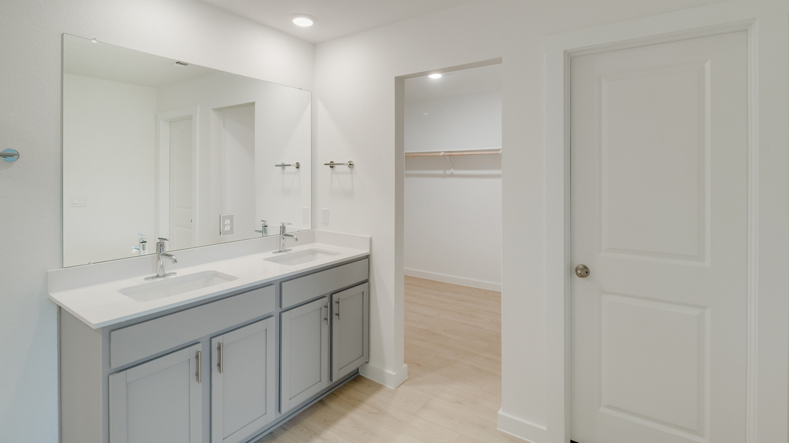Main bathroom with double vanity sink.