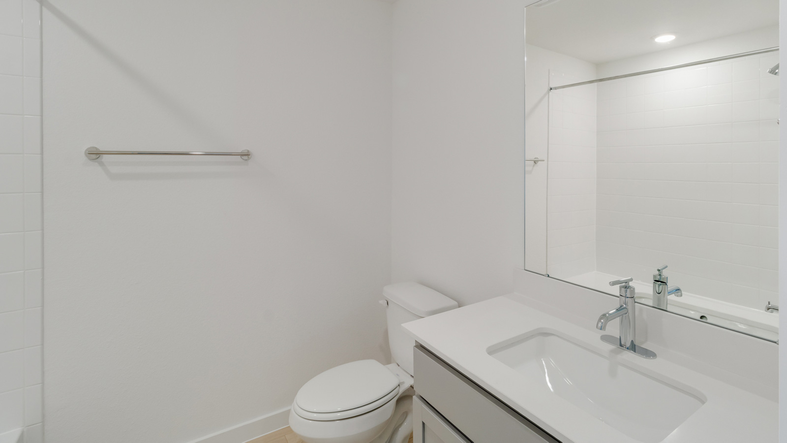 Bathroom 2 with bathtub and shower.