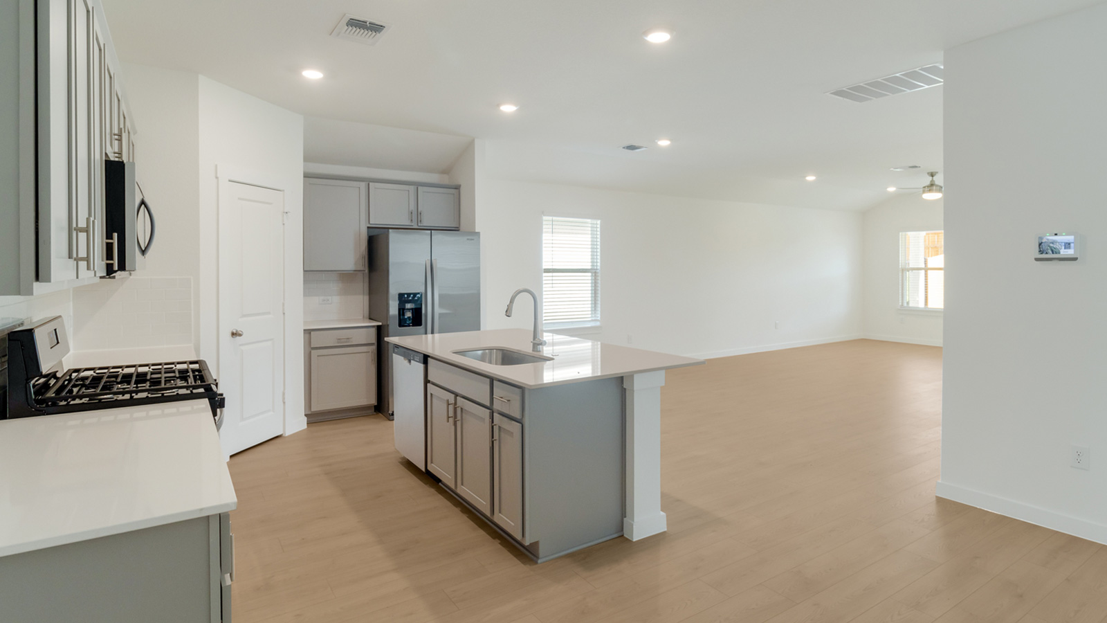 Gourmet kitchen with stainless steel appliances.