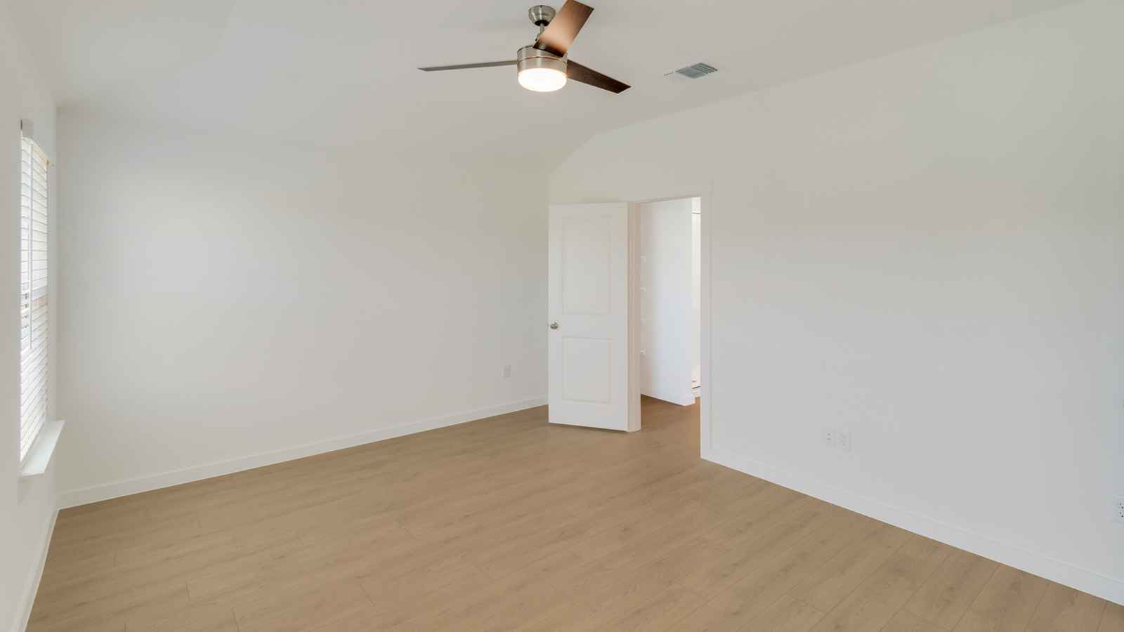 Main bedroom with adjoined bathroom.