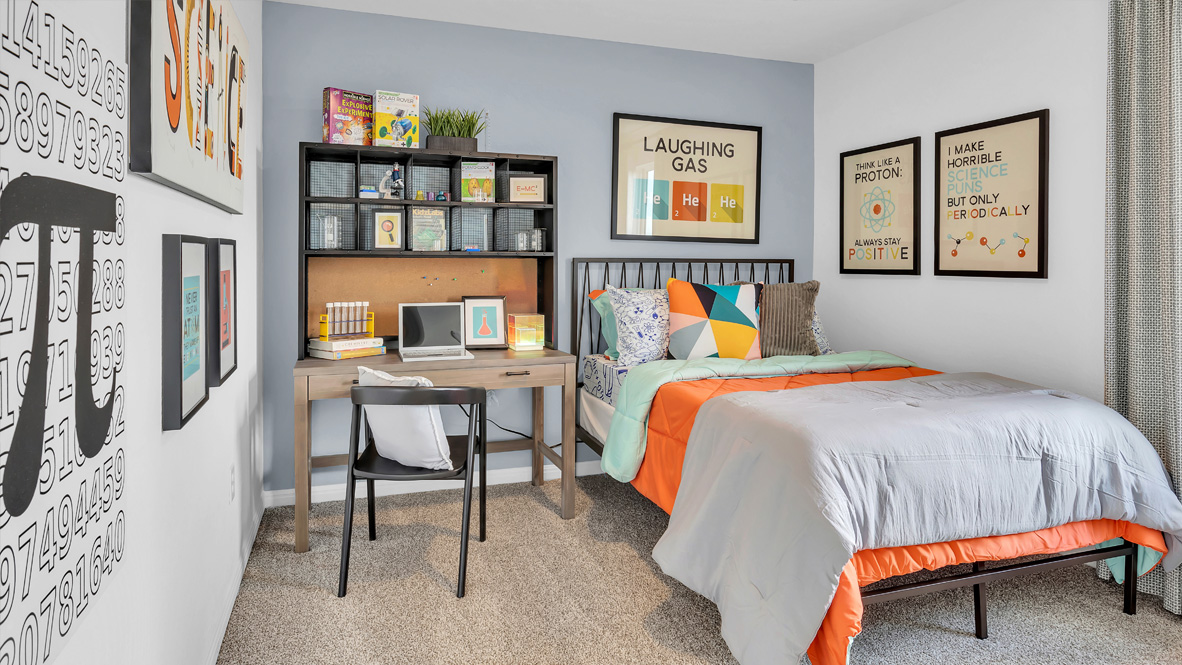 bedroom with orange and grey decor