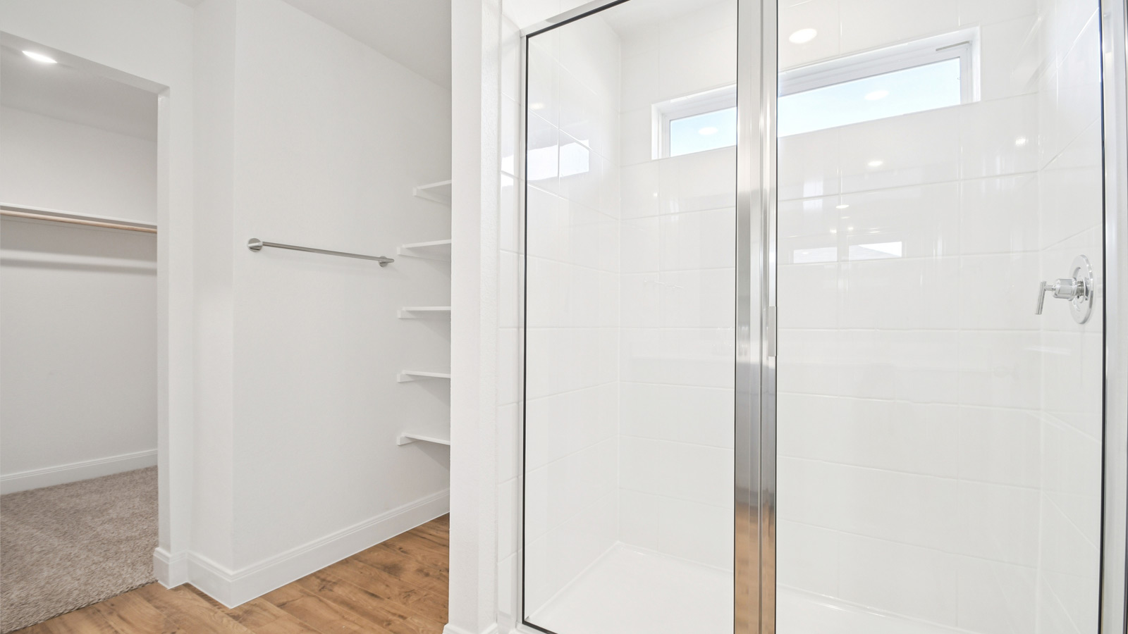 Walk-in shower in primary bathroom.