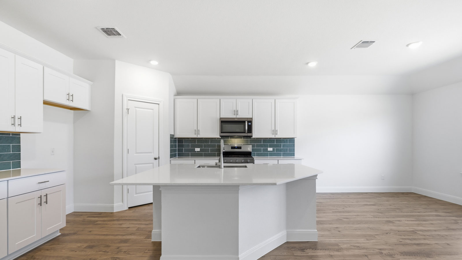Open concept kitchen and living room.