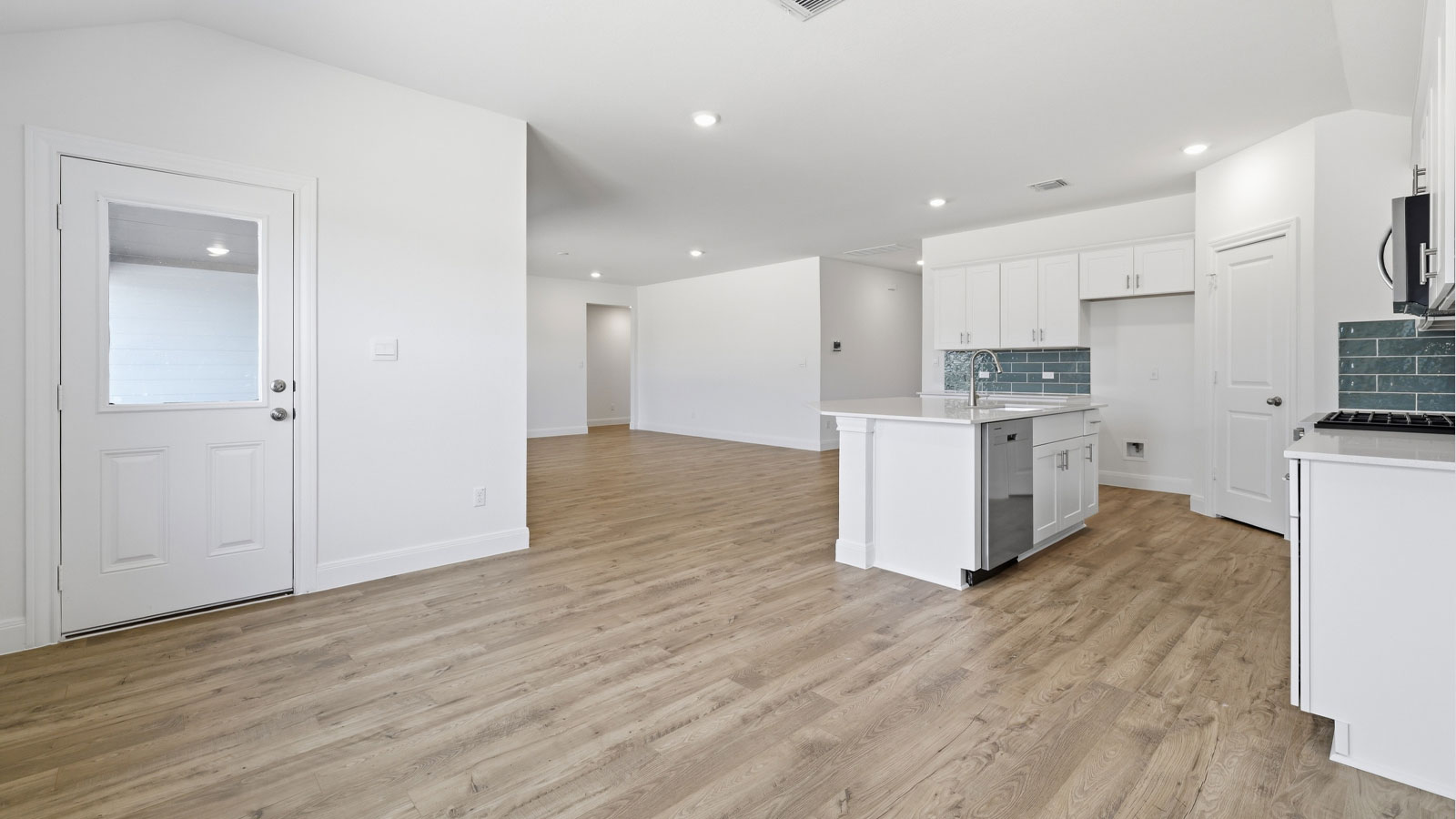 Open concept kitchen and living room.