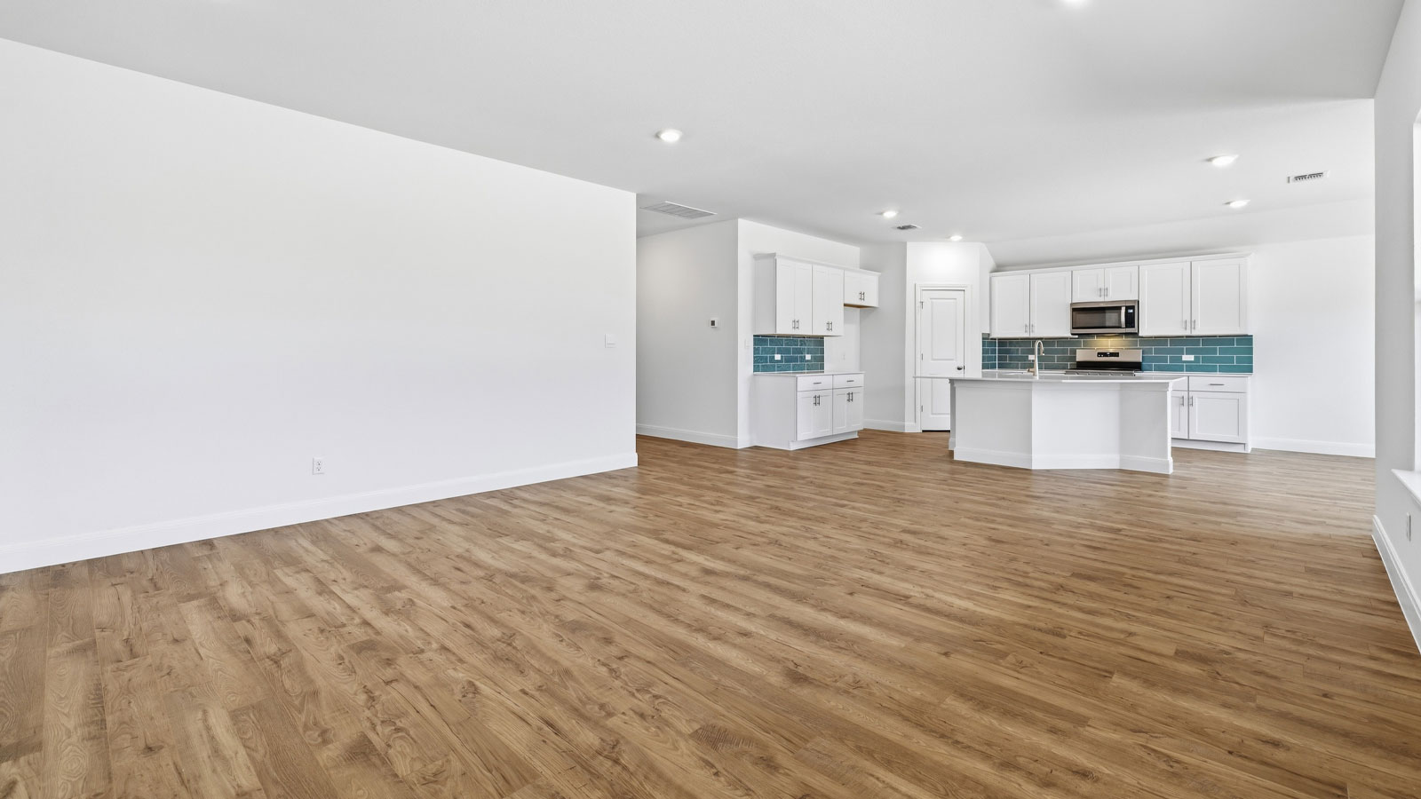 Open concept kitchen and living room.