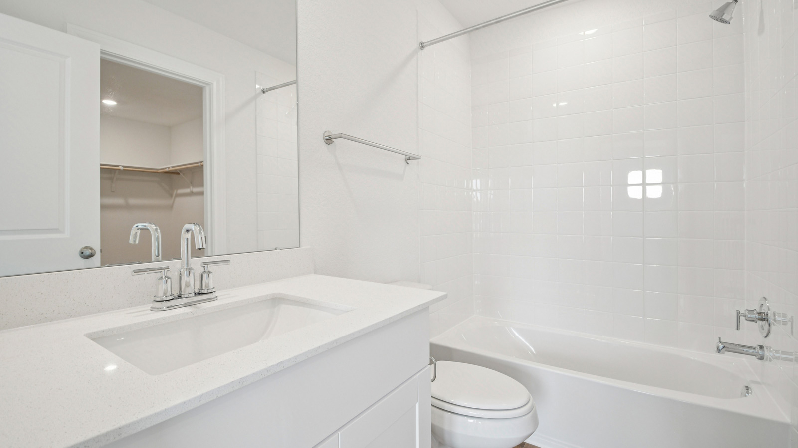 Bathroom in bedroom 4 with shower and bathtub.