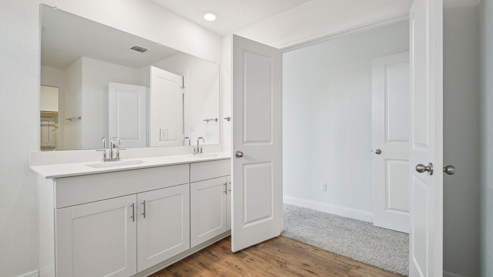 Main bathroom with double vanity sink.