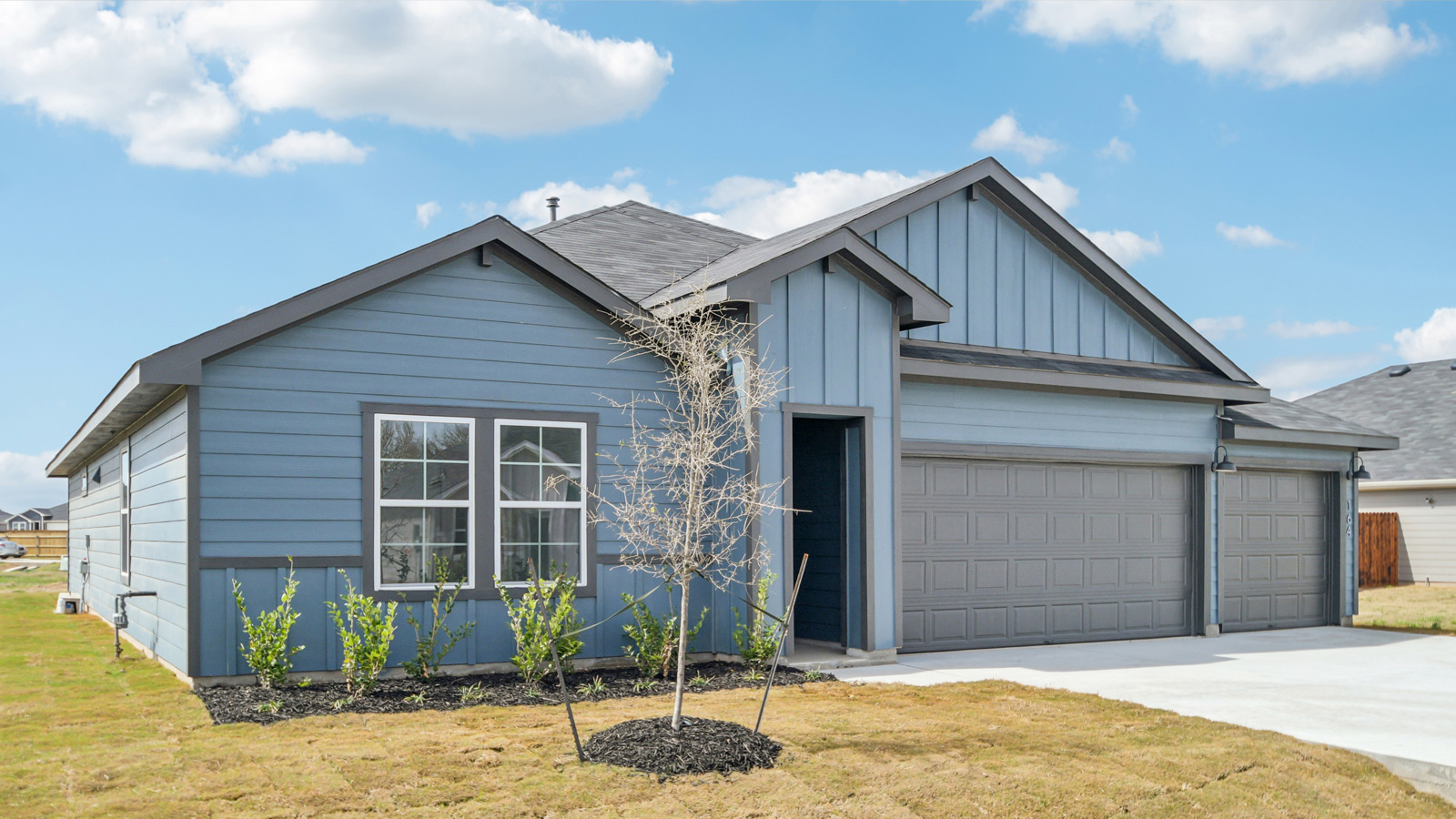 Exterior of 164 Great Northern Drive at Railhead in Cedar Creek, TX.