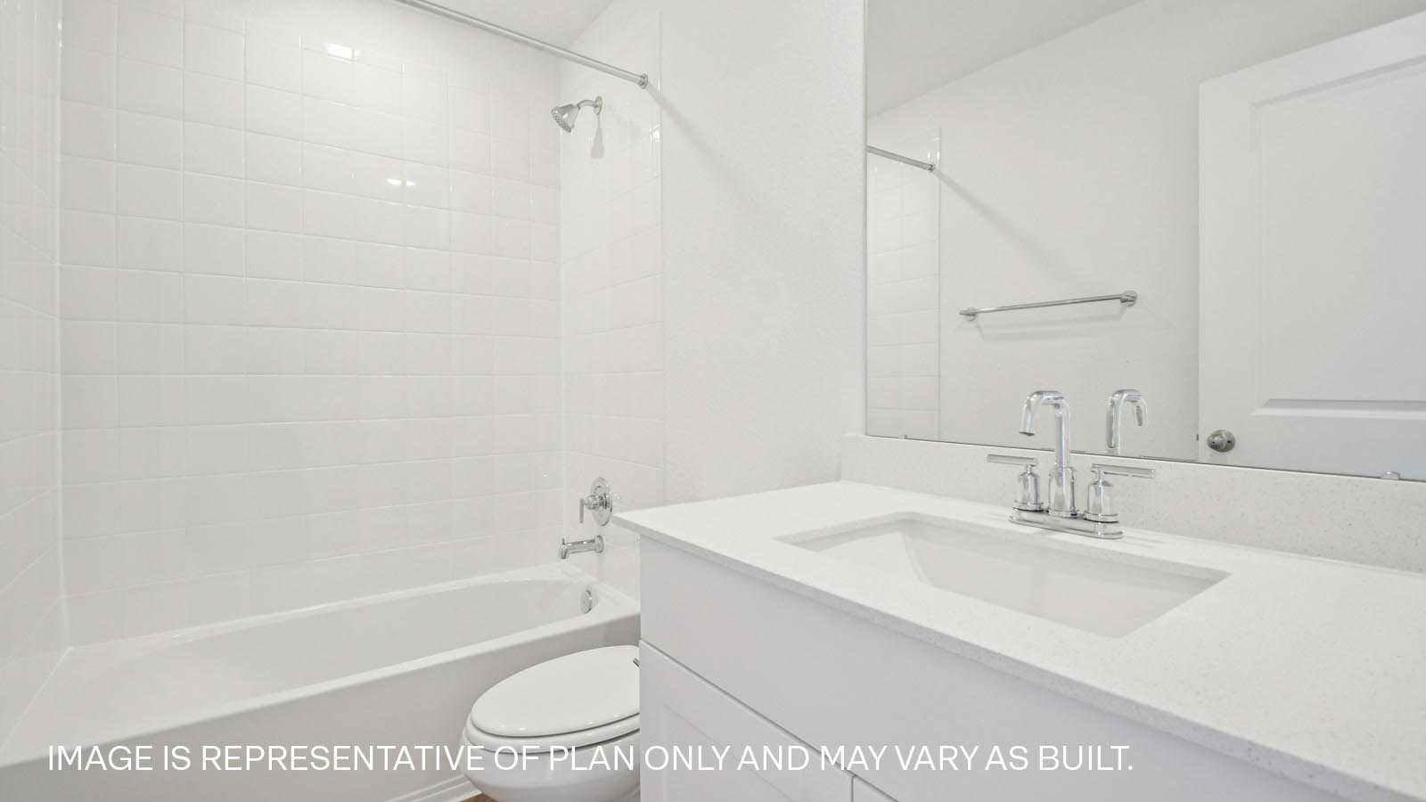 Secondary bathroom with shower and bathtub.