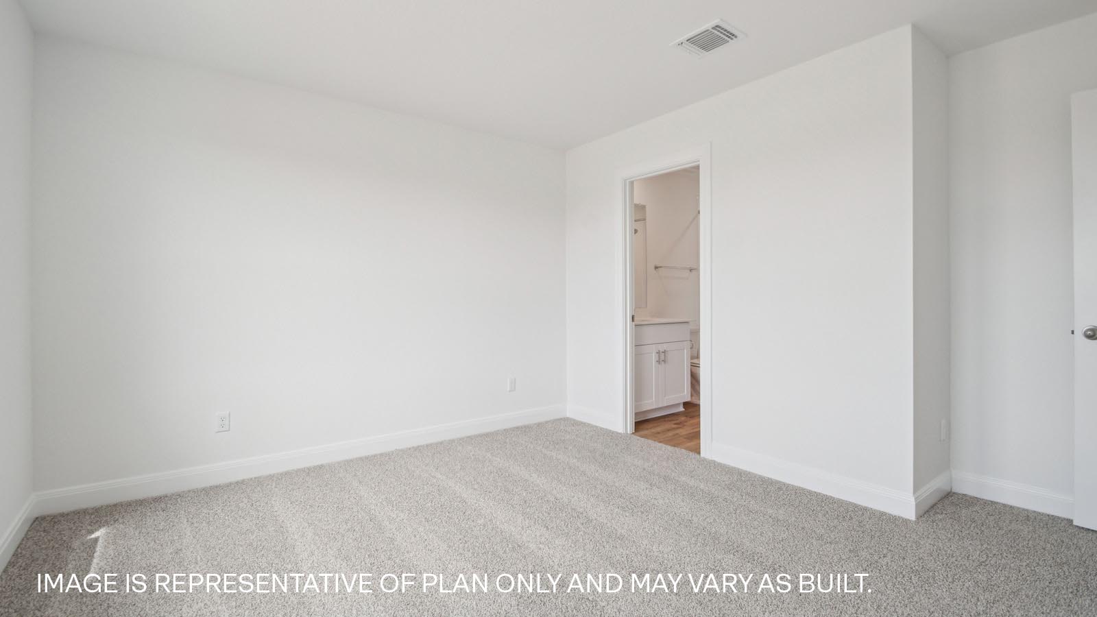 Bedroom 4 with carpeted flooring.