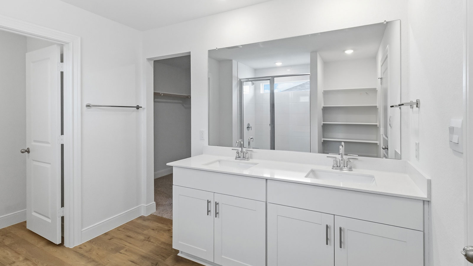 Bathroom 1 with dual quartz vanity sink.