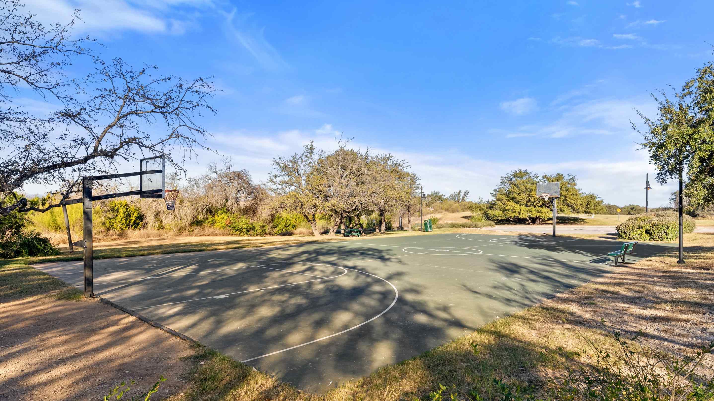 community baseket ball court outside in park