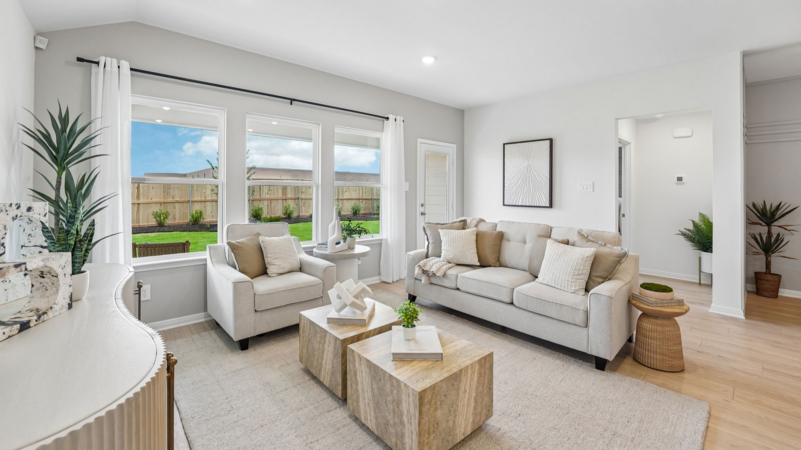 Open living area with large windows.