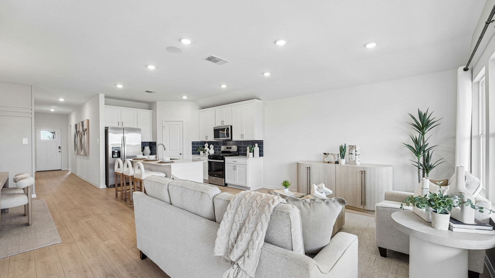 Open concept living room and kitchen.