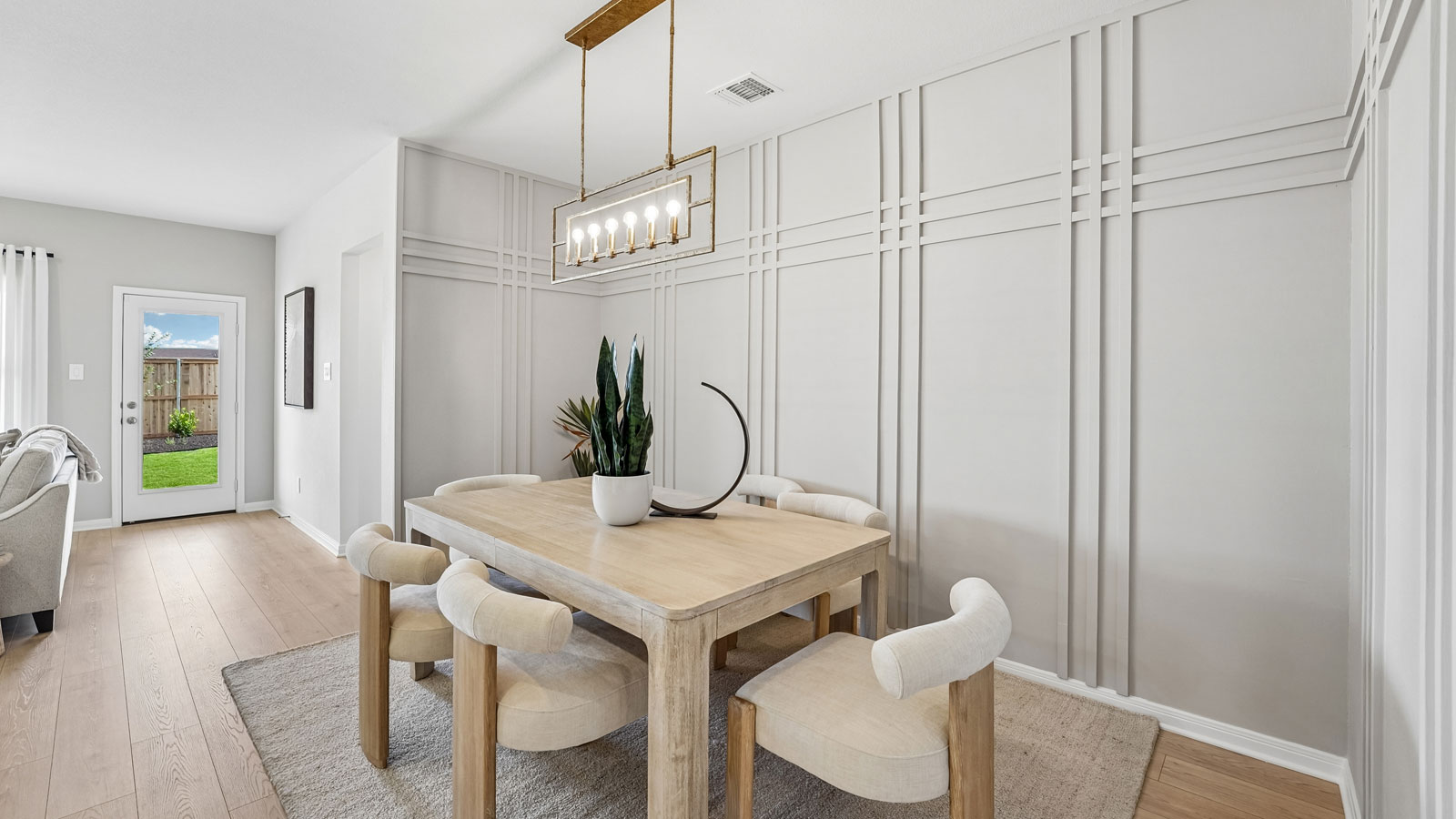 Dining area with accent wall.