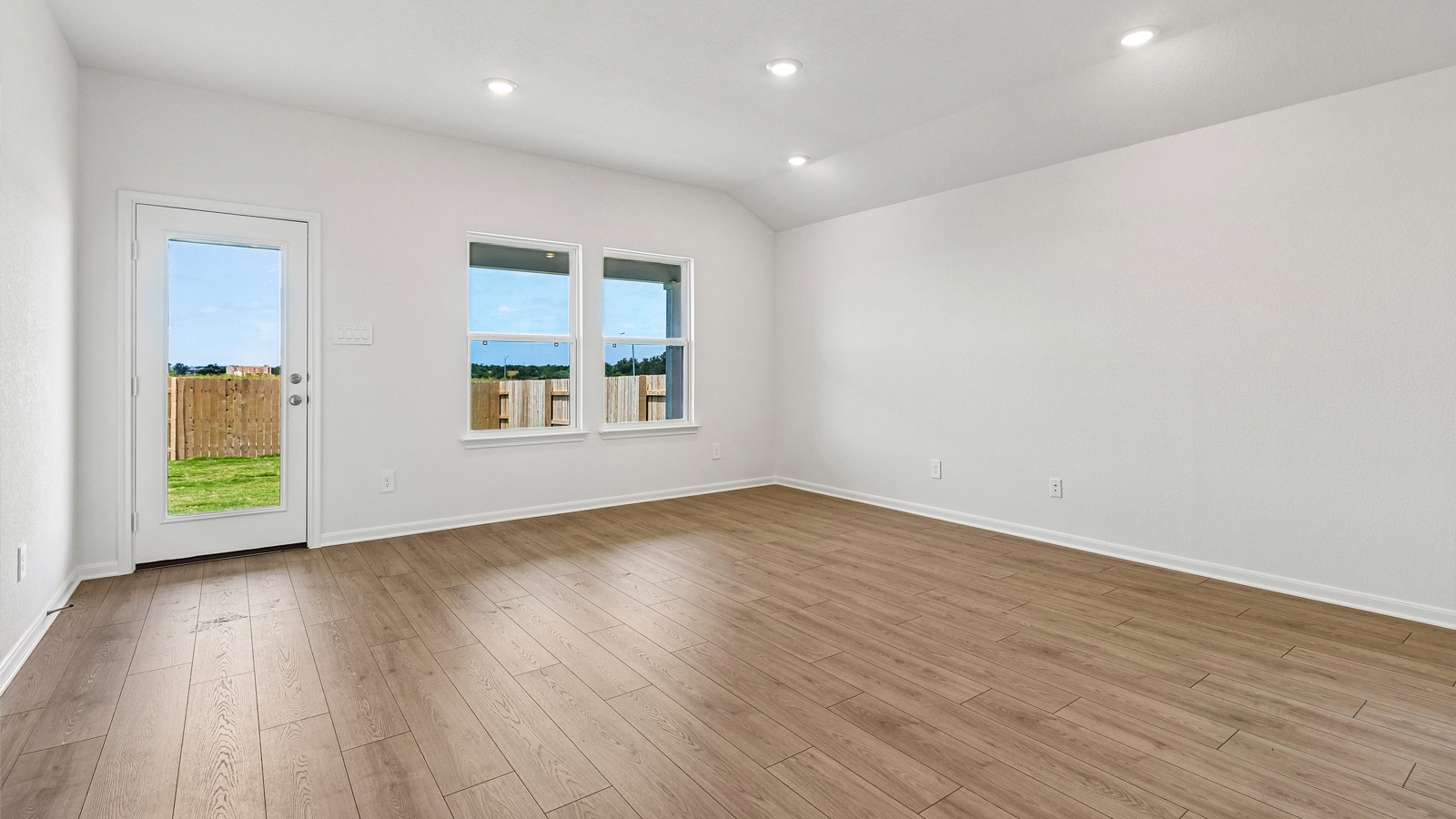 Caden Open Living area with Backyard View