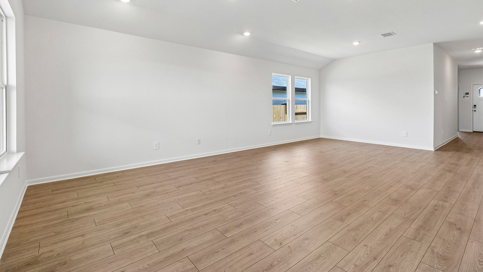 Caden Open Living area with Backyard View