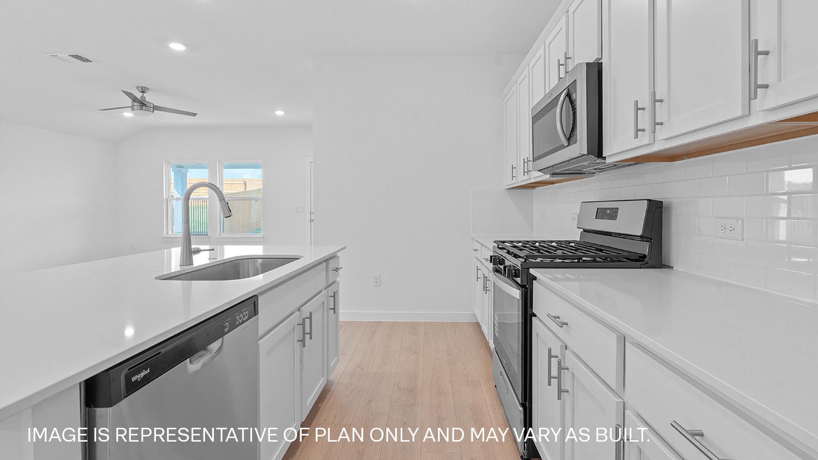 Modern kitchen with white cabinets and a kitchen island