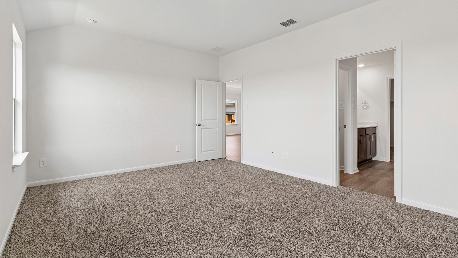 Caden Primary Bedroom with Carpet