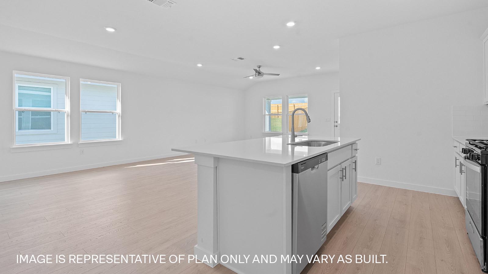 Modern kitchen with white cabinets and a kitchen island