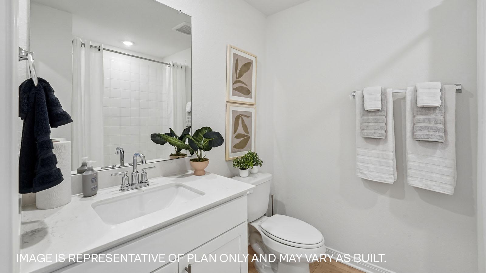 Secondary bathroom with bathtub.
