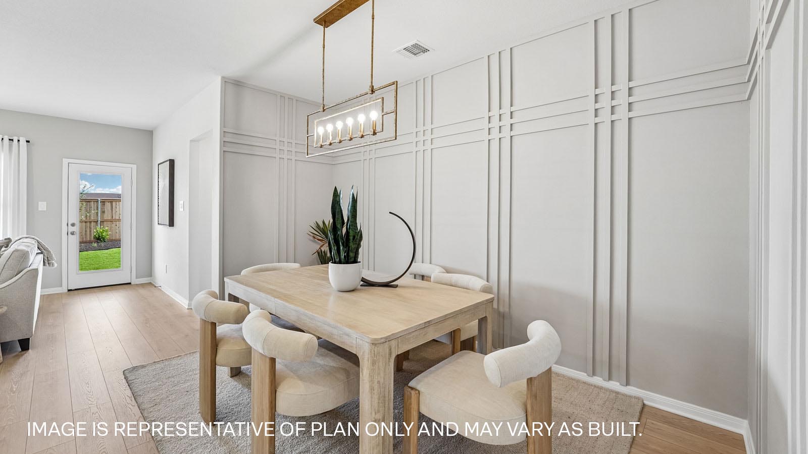 Dining area with accent wall.