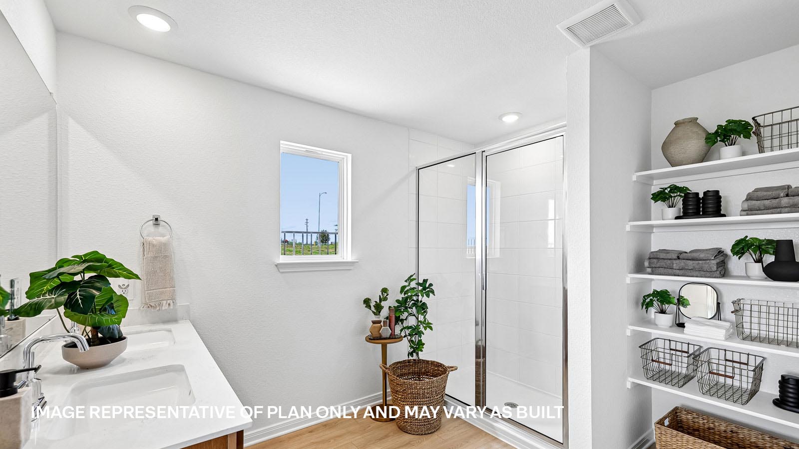 Primary bathroom with beautiful walk-in shower and window.