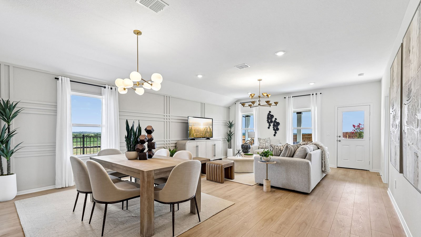 Open living and dining area inside Kingston model home.