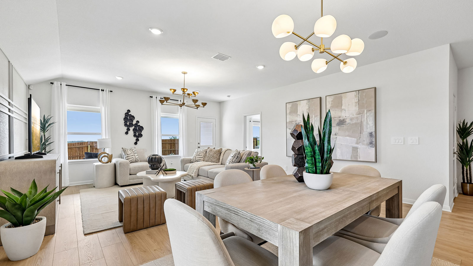 Open living and dining area inside Kingston model home.