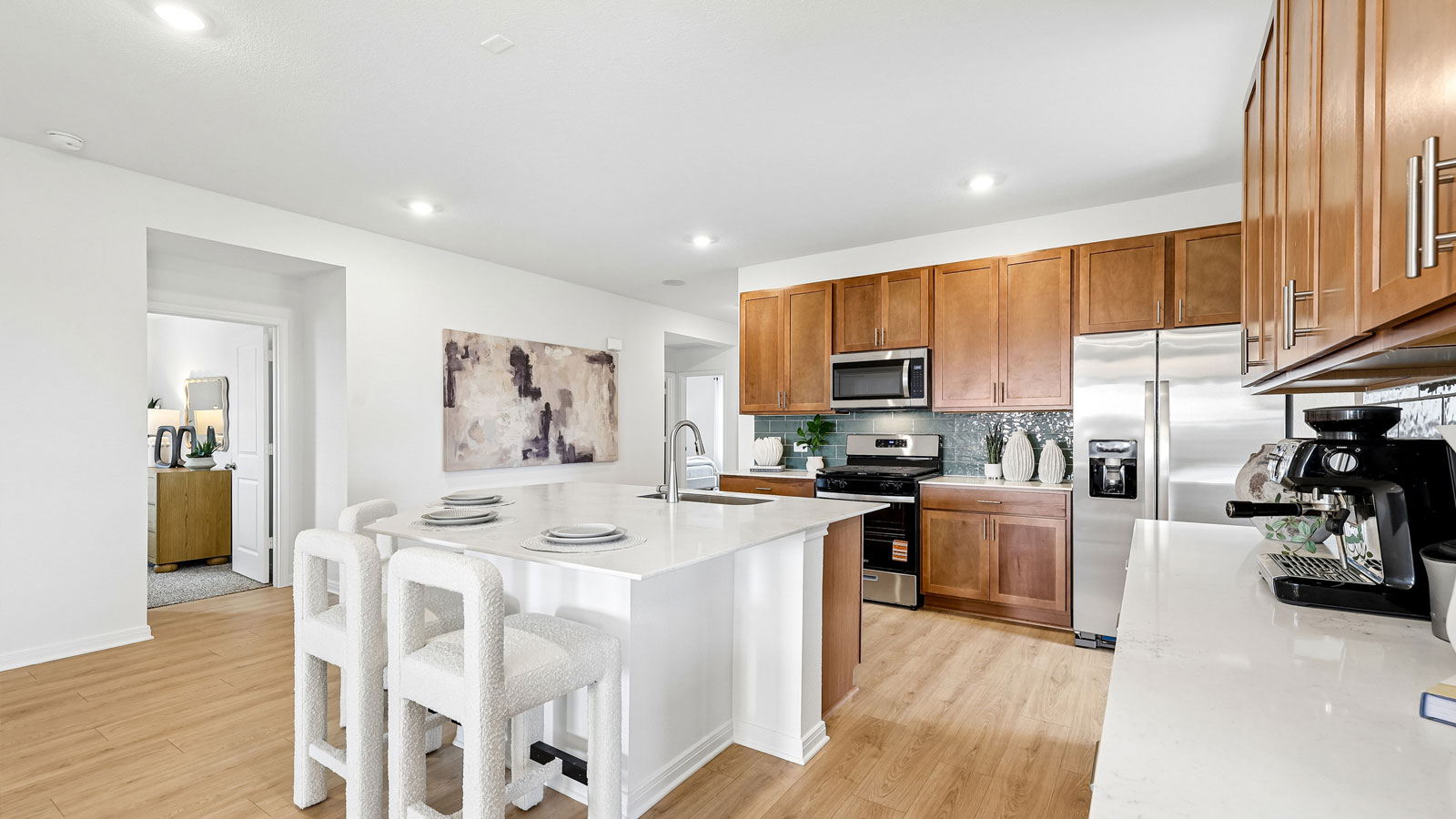 Modern kitchen with large quartz island.