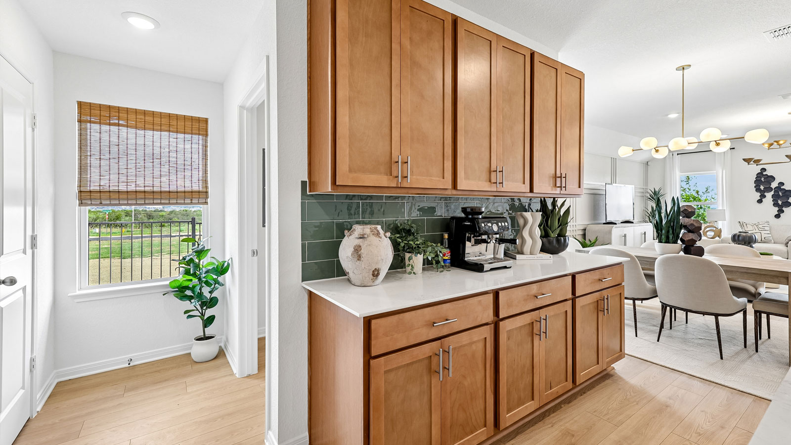 Decorative tile backsplash in kitchen.