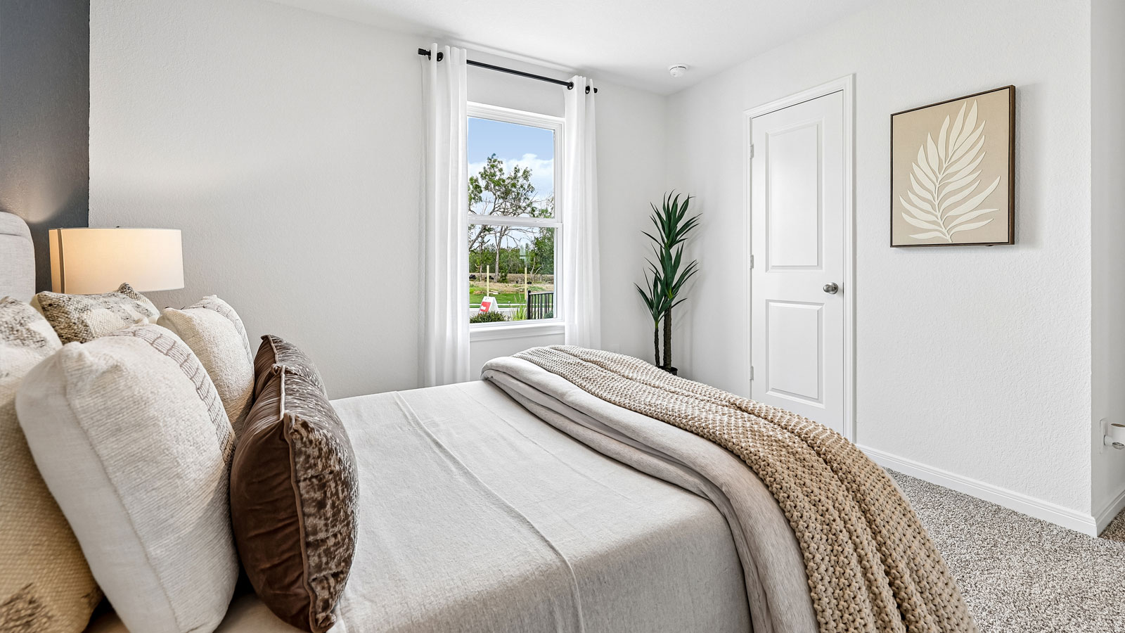 Bedroom 4 located at the front of the home.