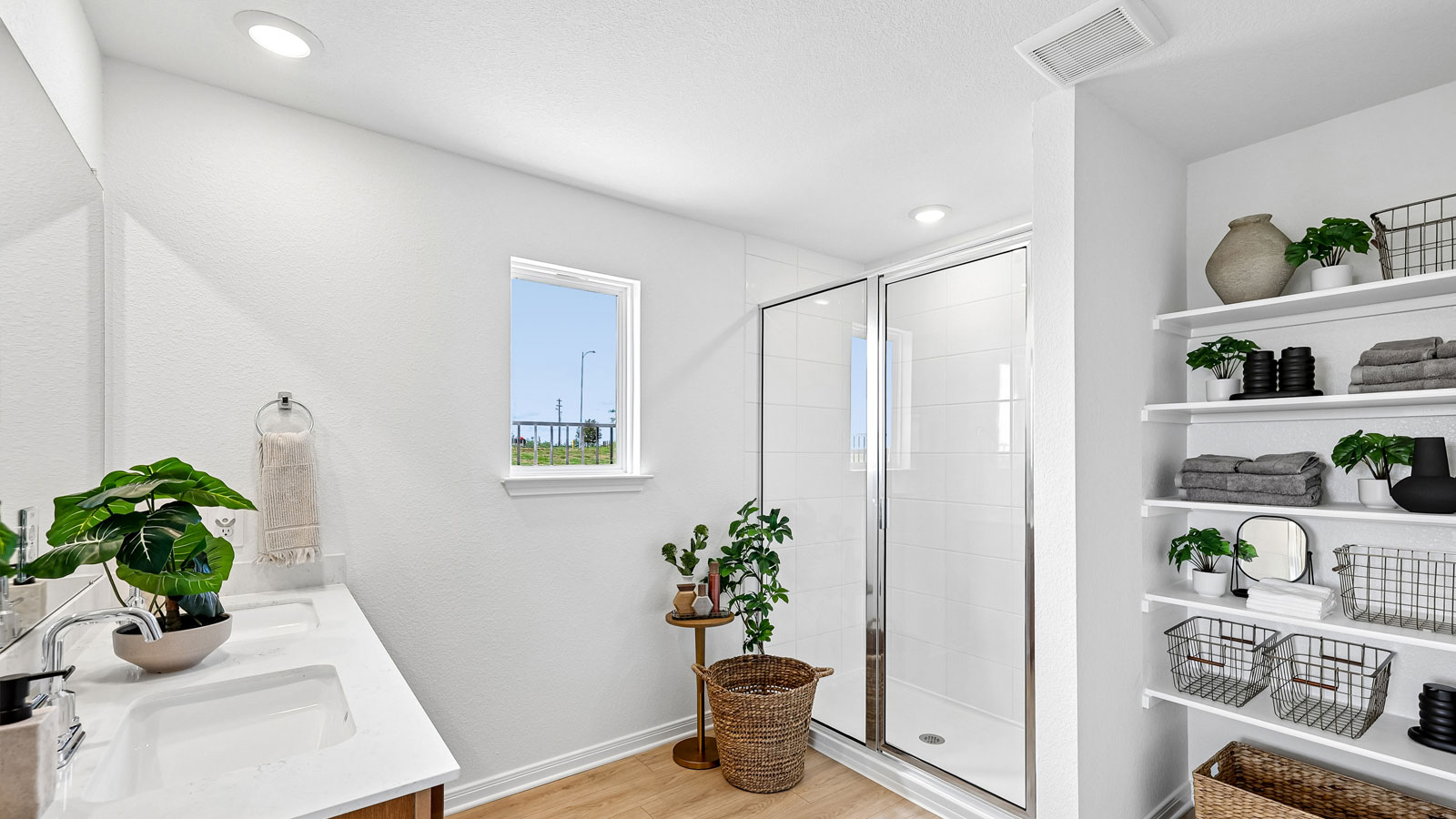Primary bathroom with beautiful walk-in shower and window.