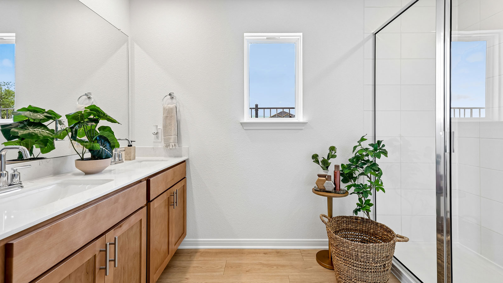 Primary bathroom with beautiful walk-in shower and window.