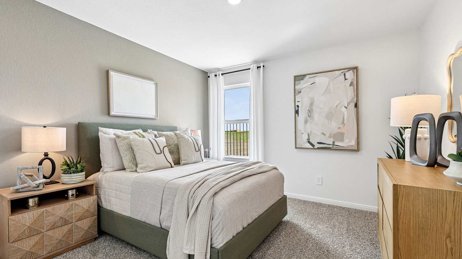 Bedroom 2 with carpeted flooring.