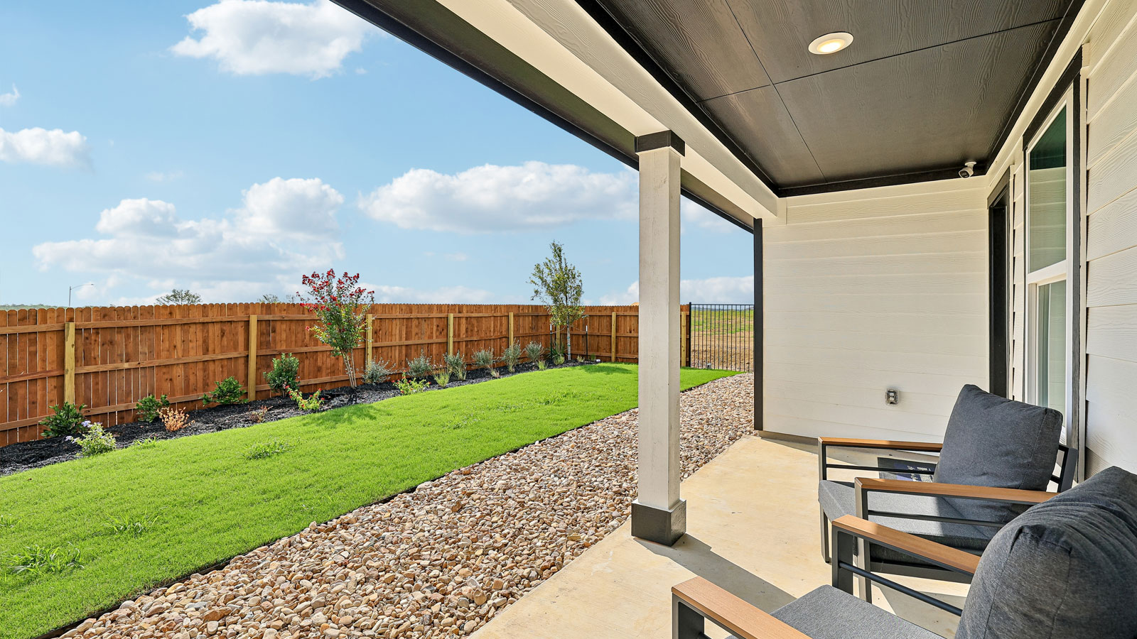 Backyard and covered back patio.