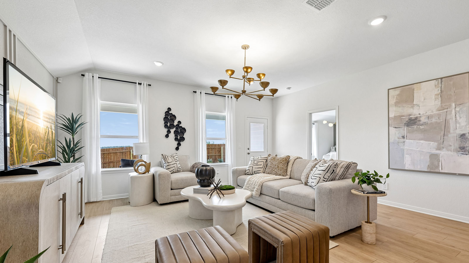 Open living area with view of backyard at Kingston model home.