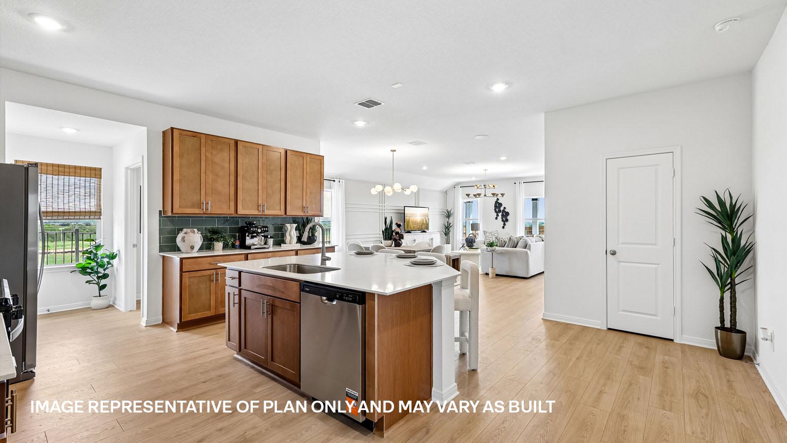 Spacious kitchen with large kitchen island and 42-inch upper kitchen cabinets.