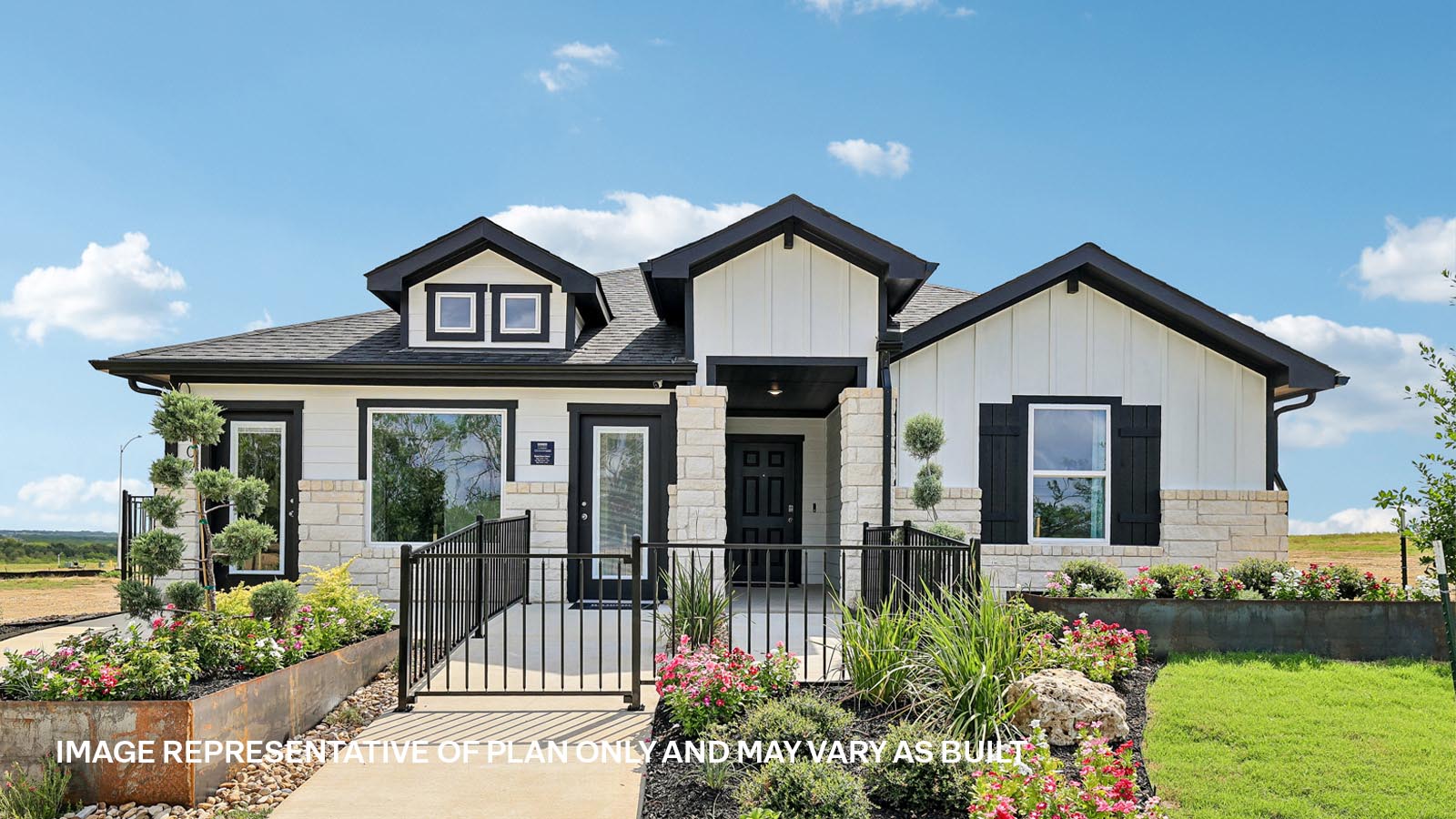 The Kingston model home, H elevation,  at Revelry in Del Valle, TX.
