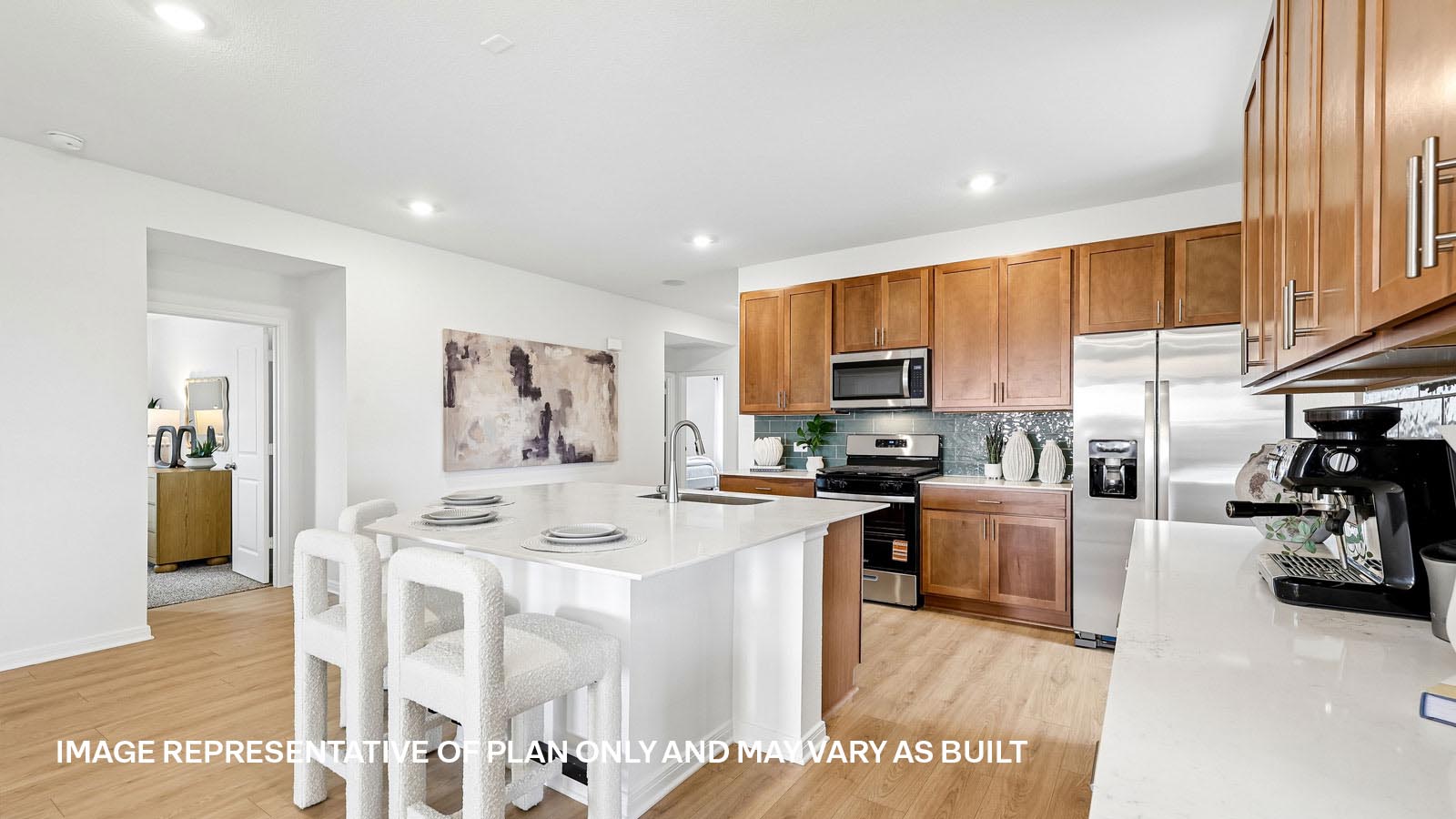 Spacious kitchen with large kitchen island and 42-inch upper kitchen cabinets.