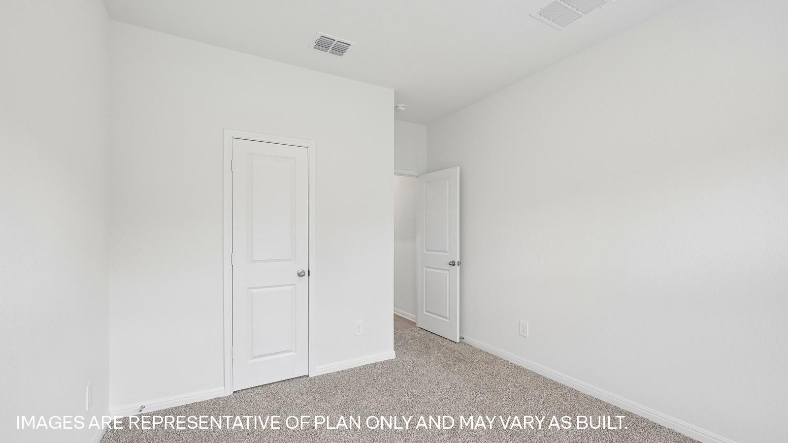 Kemah Bedroom 2 with Carpet and Backyard View