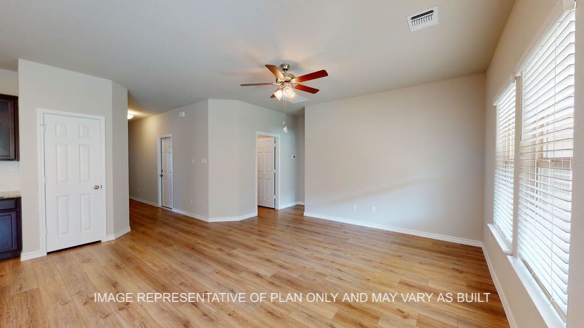 Auburn living room with vinly plank flooring throughout.