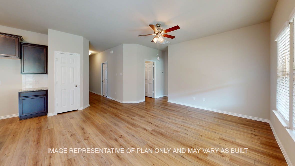 Auburn living room with vinly plank flooring throughout.