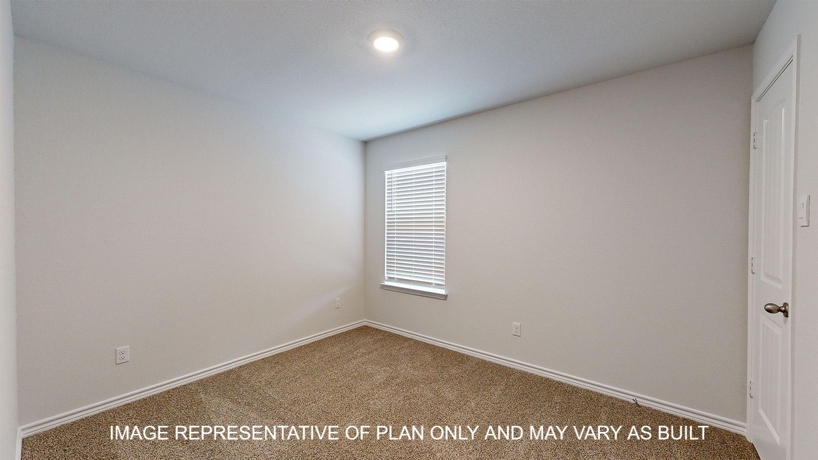 Alpine secondary bedroom with carpet flooring and window.