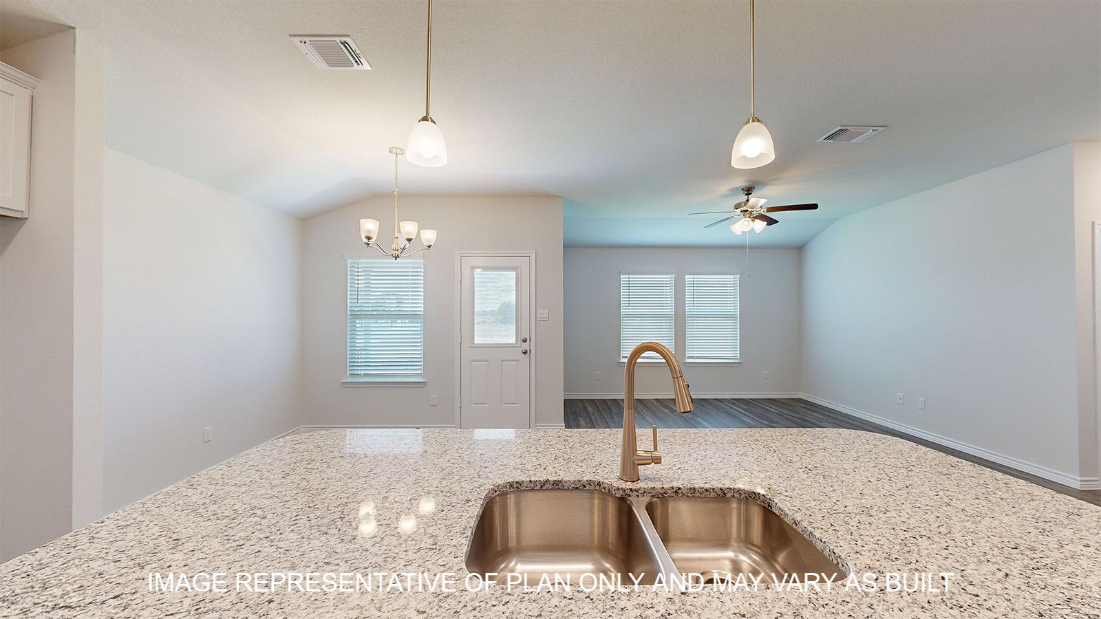 Dakota kitchen with island and undermount sink with granite countertops.