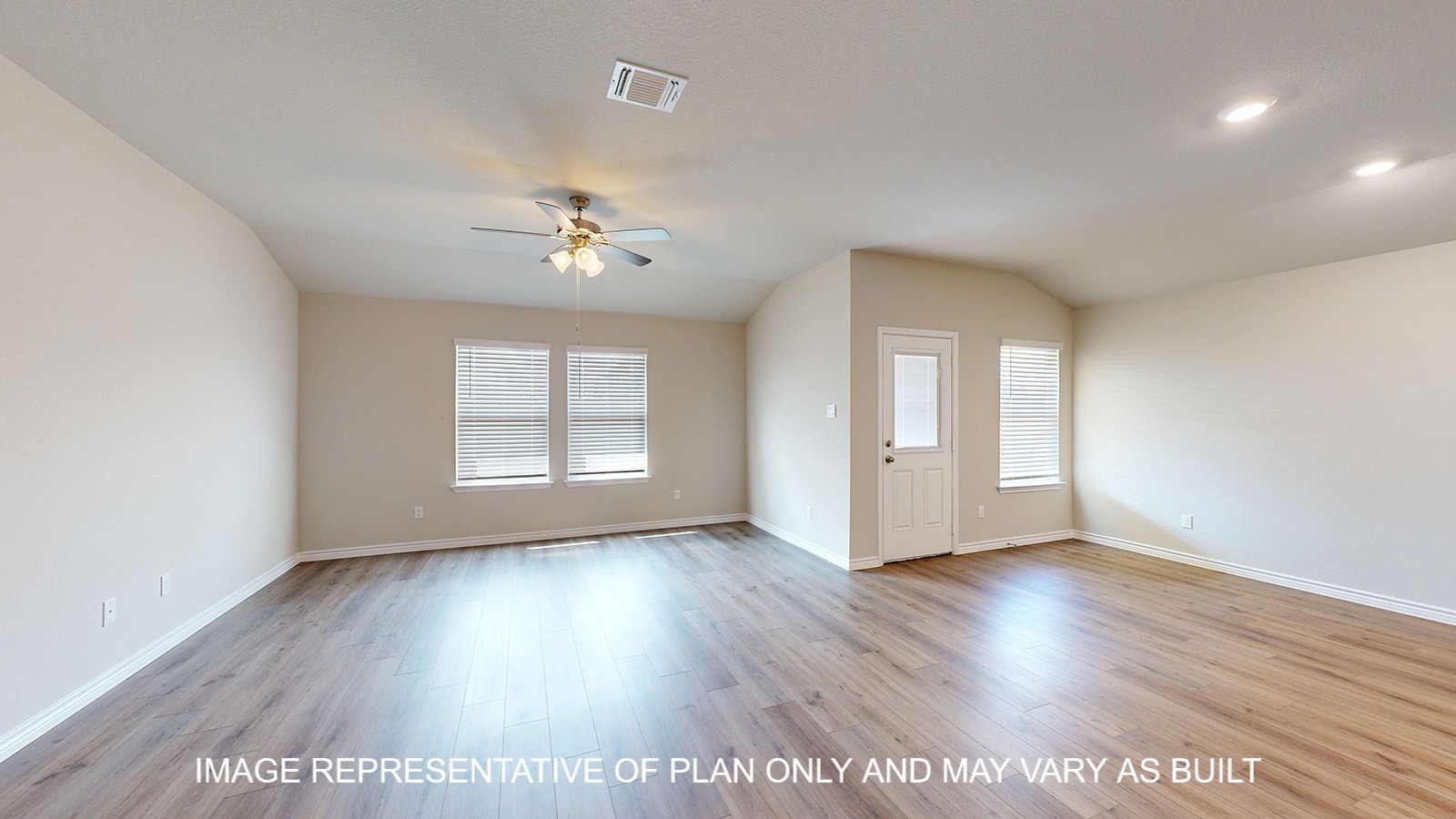 Monroe open concept living and dining room with vinyl plank flooring throughout.